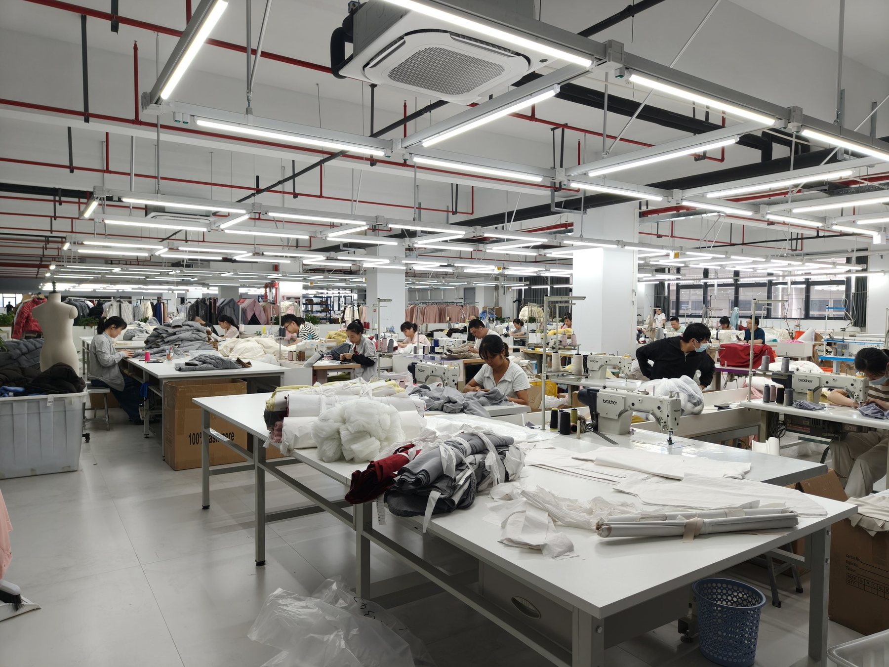 Quality control floor with garments on tables