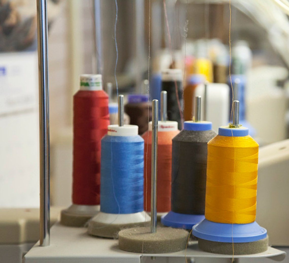 Yarn cones prepared for knitwear production