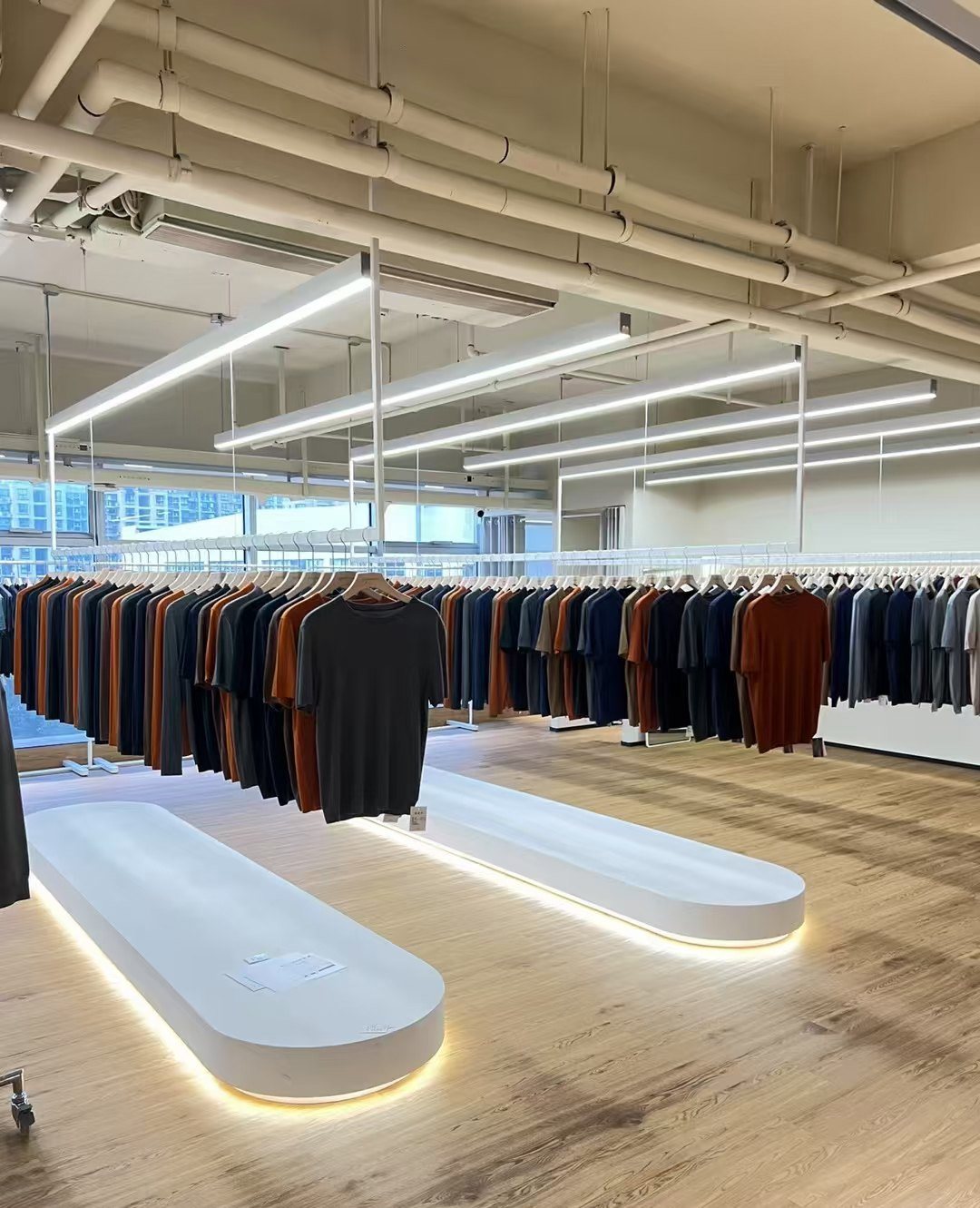 Modern showroom with knitwear racks