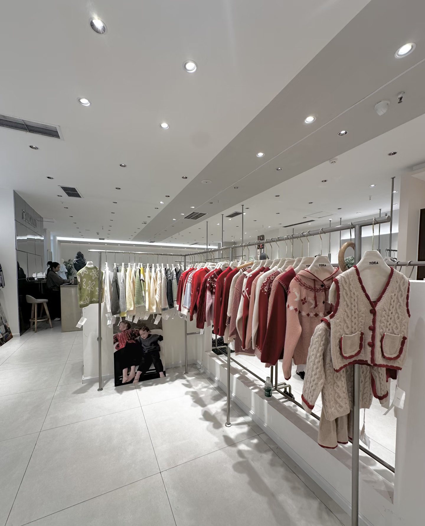 Knitwear collection displayed on racks